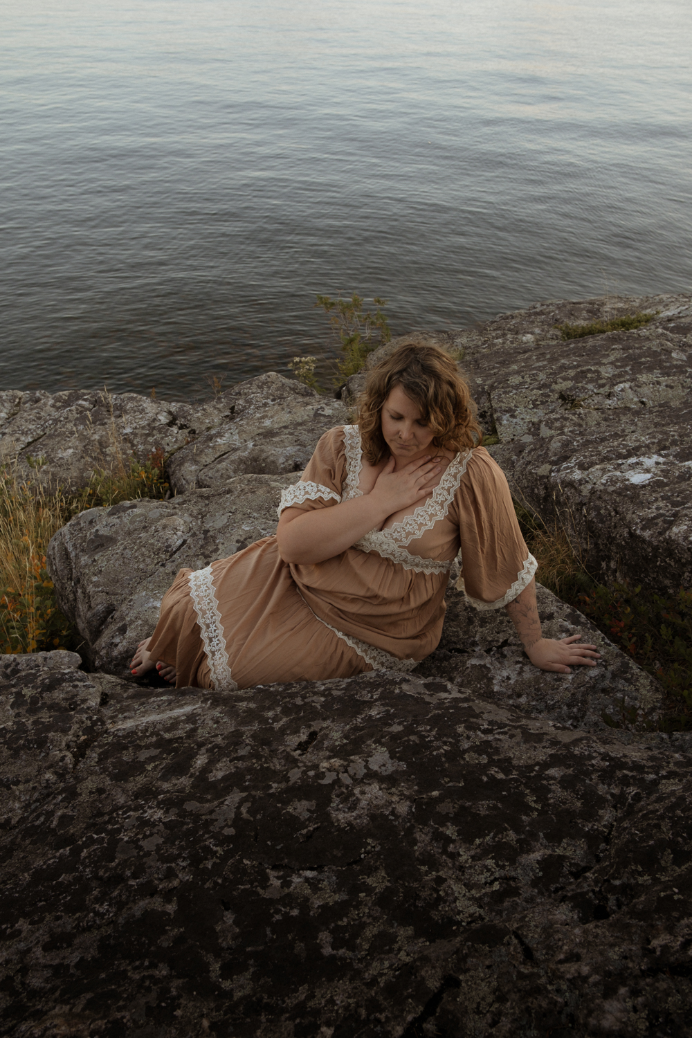 wedding photographer engages with nature outside for her brand photos