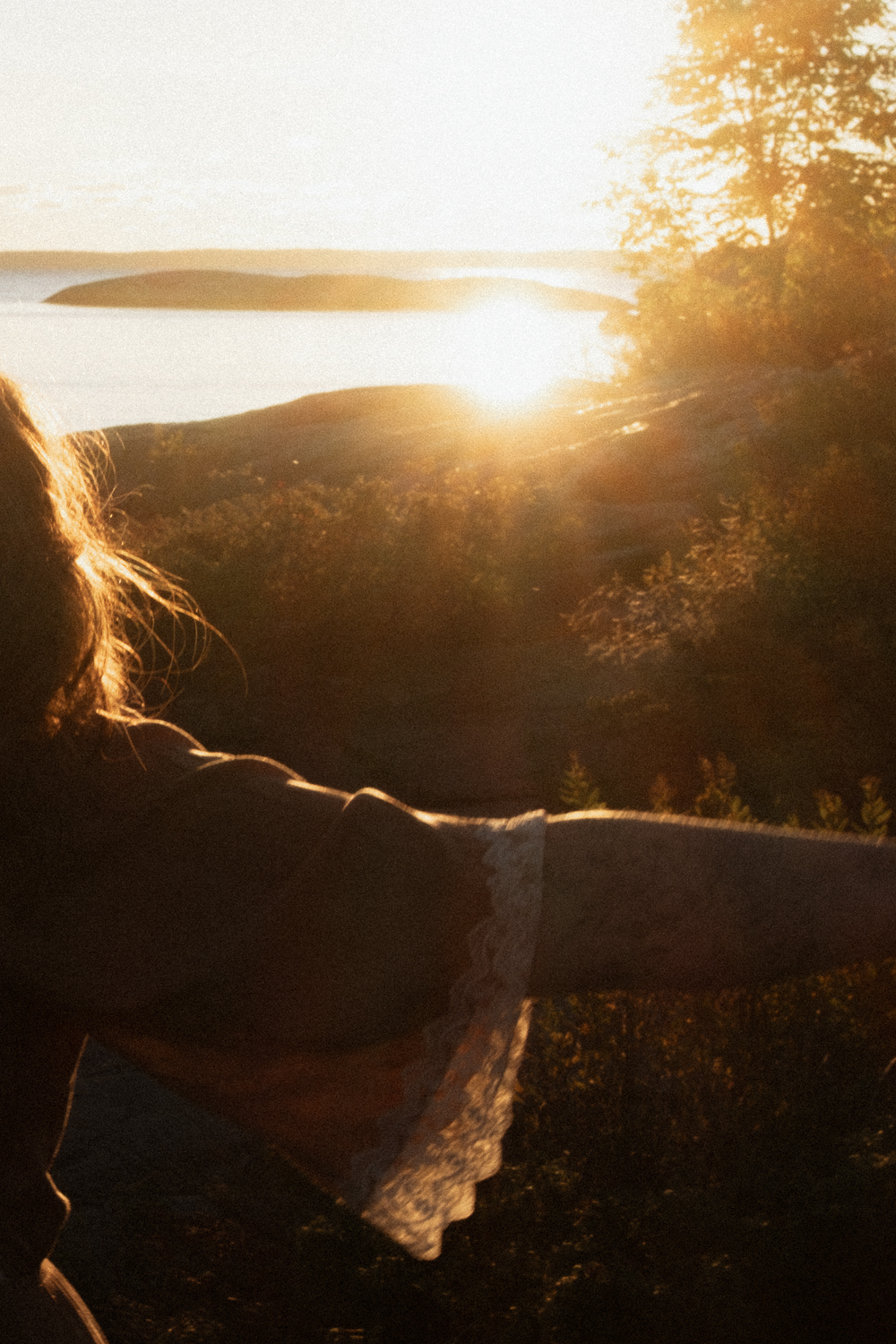 wedding photographer engages with nature outside for her brand photos