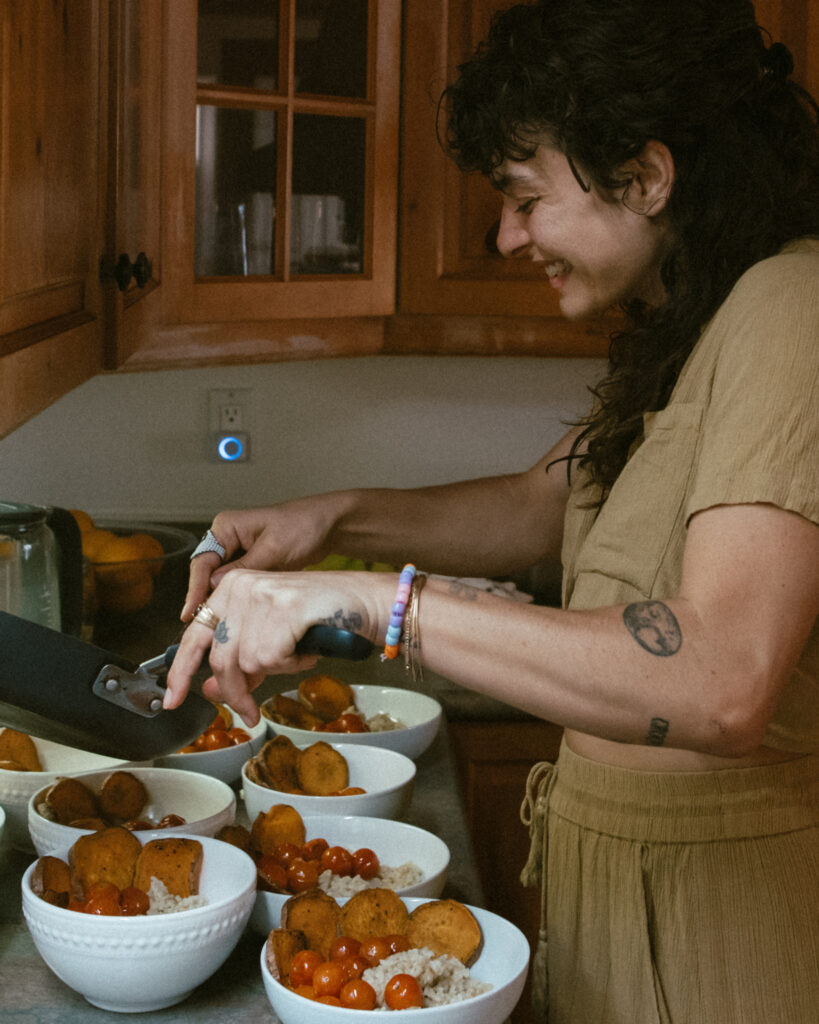 Woman smiling and preparing meals
