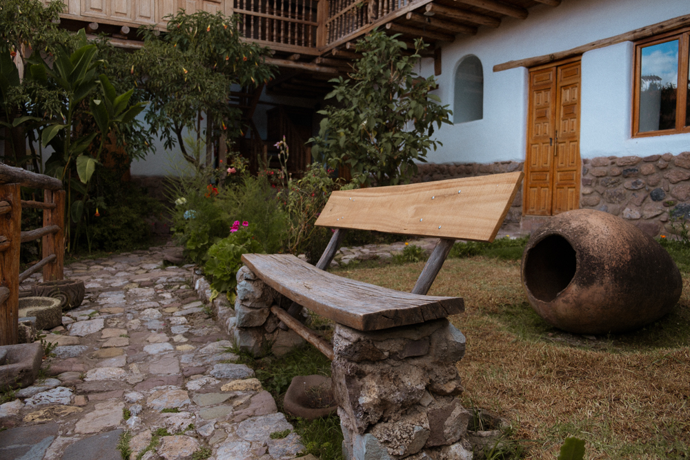 Bench in the outdoor garden at a Peruvian hotel in Cusco